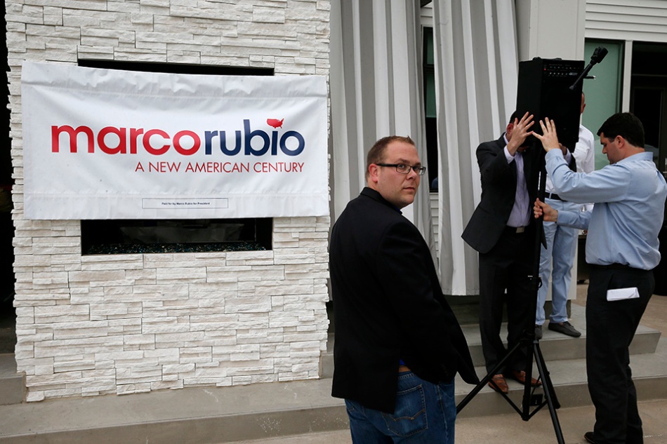 The sound system is set up for Republican presidential candidate Sen. Marco Rubio (R-FL) at a poolside happy hour in Coralville on Wednesday, July 8, 2015. (Adam Wesley/The Gazette)