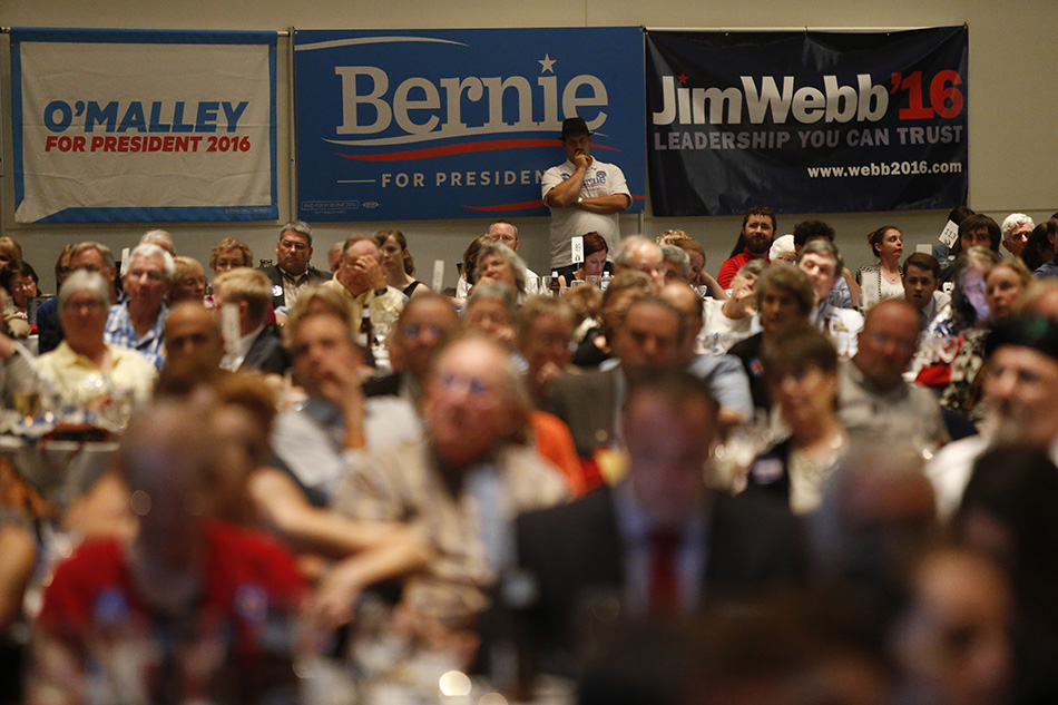 The audience listens to a speaker at the 2015 Iowa Democratic Party Hall of Fame Celebration at the Cedar Rapids Convention Center in Cedar Rapids on Friday, July 17, 2015. (Adam Wesley/The Gazette)