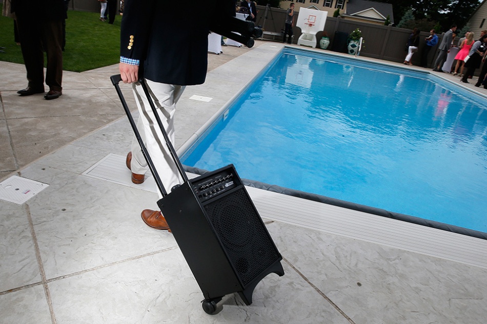 The sound system is wheeled past the pool after a speech by Republican presidential candidate Sen. Marco Rubio (R-FL) during a poolside happy hour in Coralville on Wednesday, July 8, 2015. (Adam Wesley/The Gazette)
