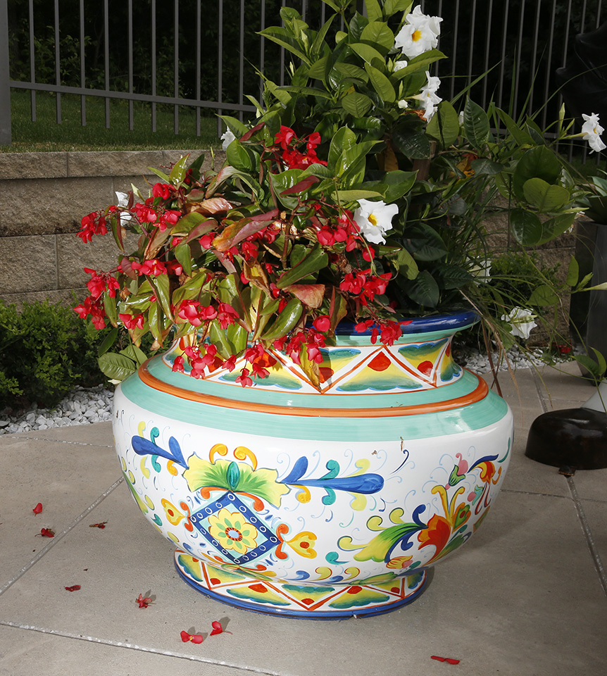 A flower pot in the yard hosting Republican presidential candidate Sen. Marco Rubio (R-FL) for a poolside happy hour in Coralville on Wednesday, July 8, 2015. (Adam Wesley/The Gazette)