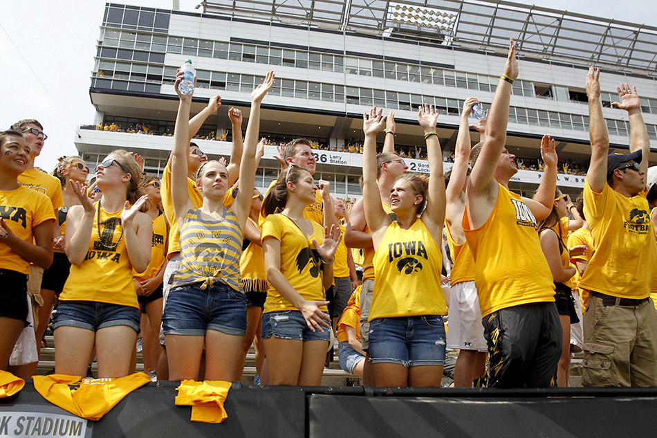 Student reaction to a late-game touchdown by Iowa in a NCAA college football game at Kinnick Stadium in Iowa City on Saturday, Sept. 5, 2015. (Adam Wesley/The Gazette)