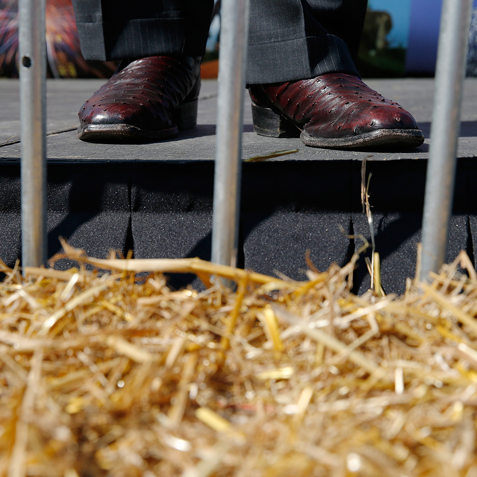 GOP presidential candidate Mike Huckabee's shoes are shown as he speaks on the Des Moines Register Soapbox at the 2015 Iowa State Fair in Des Moines on Thursday, Aug. 13, 2015. (Adam Wesley/The Gazette)