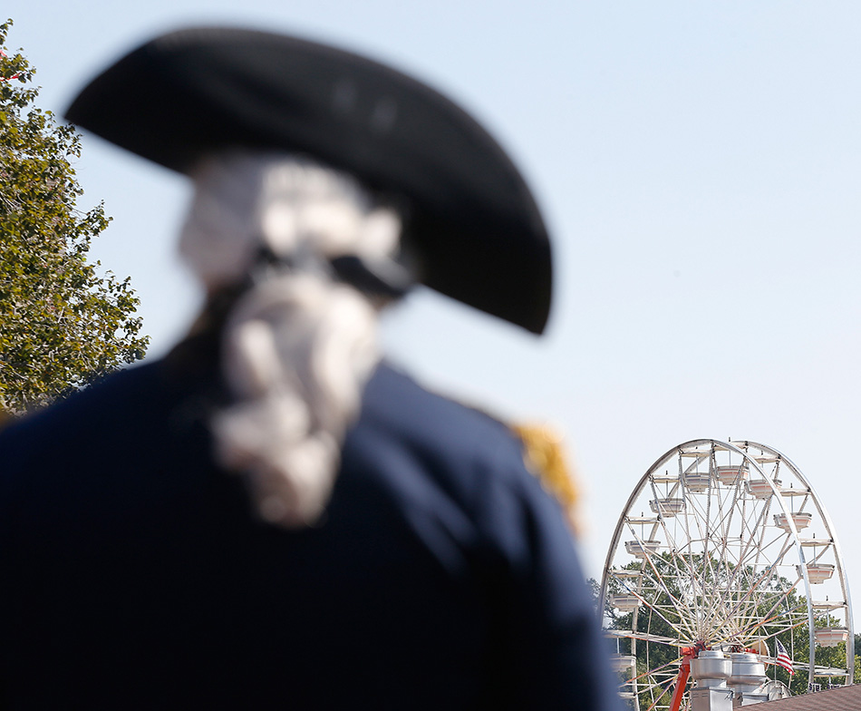 A George Washington impersonator speaks on the Des Moines Register Soapbox at the 2015 Iowa State Fair in Des Moines on Thursday, Aug. 13, 2015. (Adam Wesley/The Gazette)