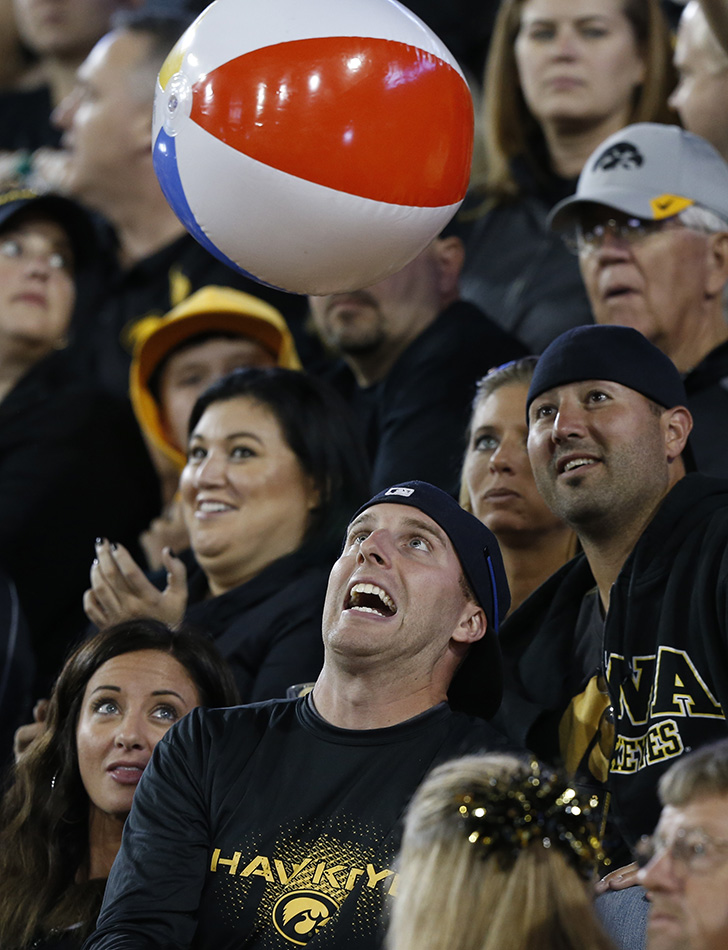 An Iowa fan eyes a beach ball at Kinnick Stadium in Iowa City on Saturday, Sept. 19, 2015. (Adam Wesley/The Gazette)