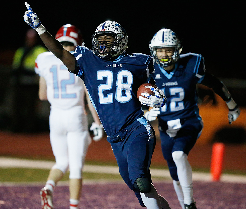 Cedar Rapids Jefferson's Valentino Green (28) celebrates after scoring a touchdown against Dubuque Senior in a 1st round class 4A high school football playoff game at Ash Park Stadium at Cornell College in Mount Vernon on Wednesday, Oct. 28, 2015. (Adam Wesley/The Gazette)