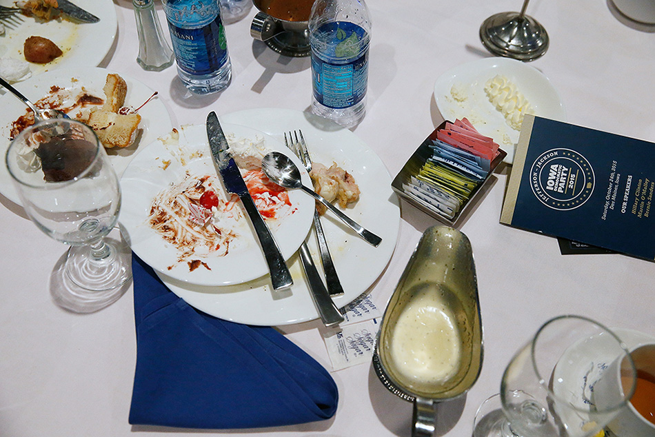 A table setting is shown after the Iowa Democratic Party's Jefferson-Jackson Dinner in Des Moines on Saturday, Oct. 24, 2015. (Adam Wesley/The Gazette)