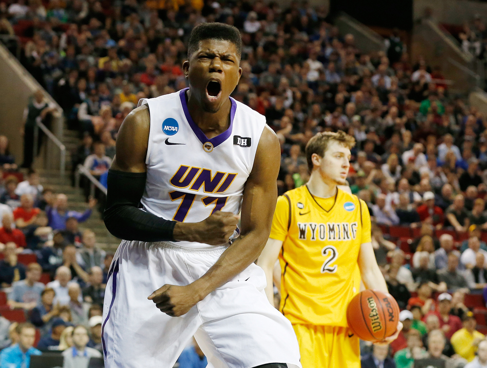 Northern Iowa guard Wes Washpun (11) celebrates after drawing a foul against Wyoming in a 2nd round men's basketball NCAA tournament game at KeyArena in Seattle on Friday, March 20, 2015. (Adam Wesley/The Gazette)